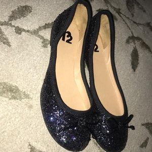 Never worn black sparkly flats.